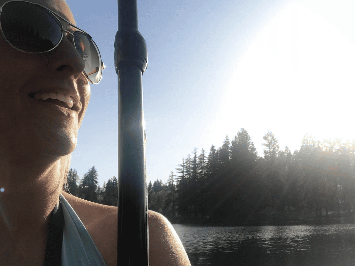 Kayaking on a peaceful Washington lake during a sunny morning