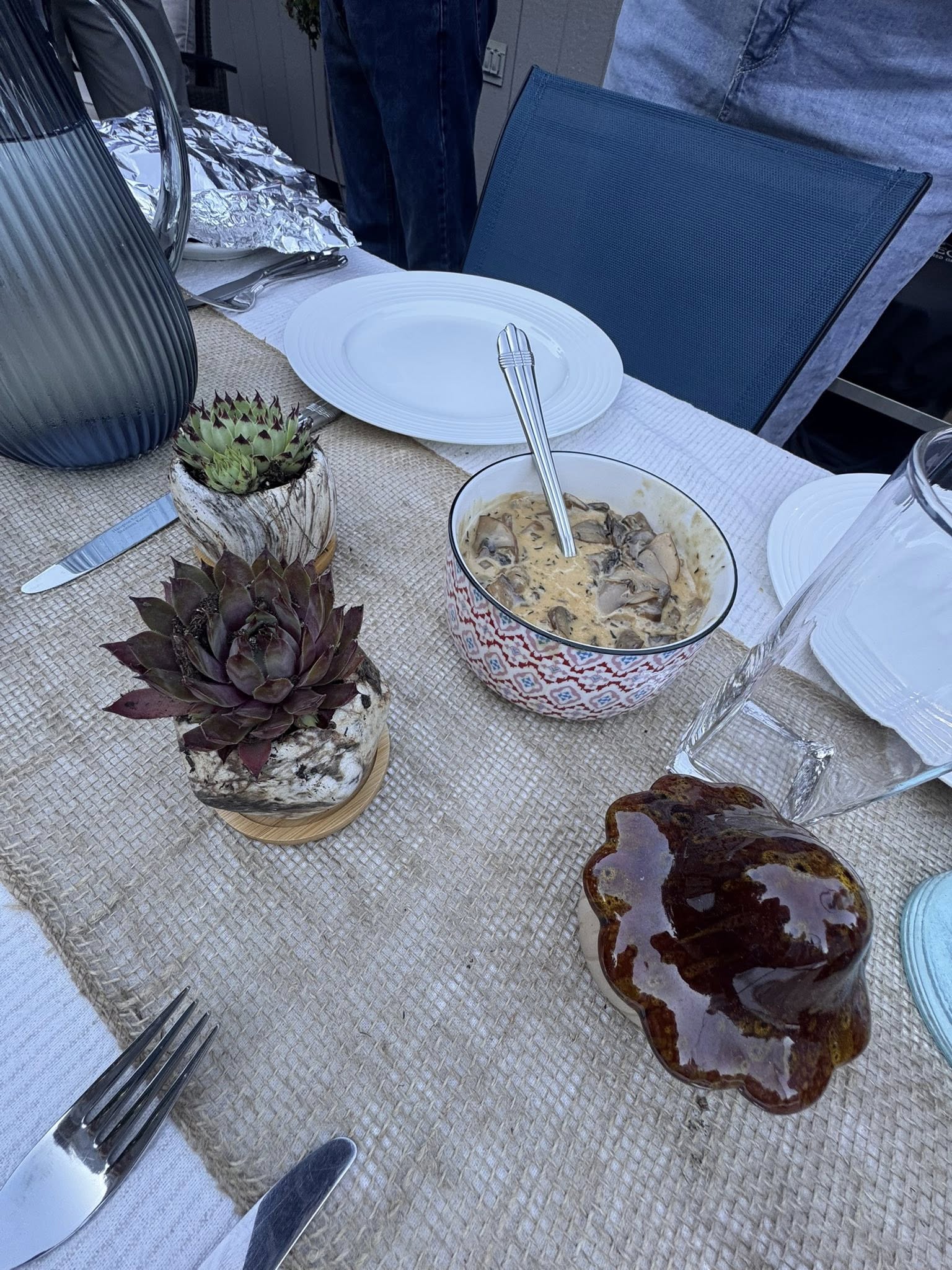 Dark woodland table setting for a mushroom and truffle themed dinner club